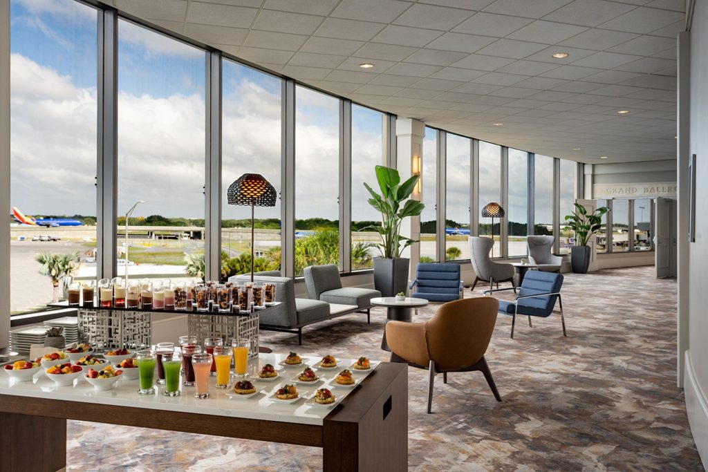 Photo of lounge overlooking runway at Tampa Airport Marriott